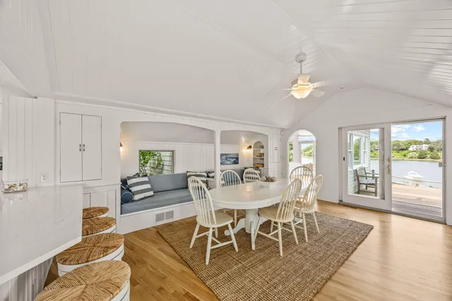 a bedroom with a bed and a mirror