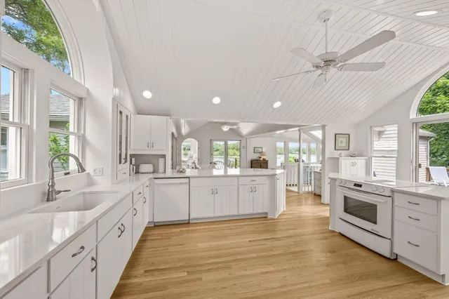 a view of swimming pool with lake and mountain in the back