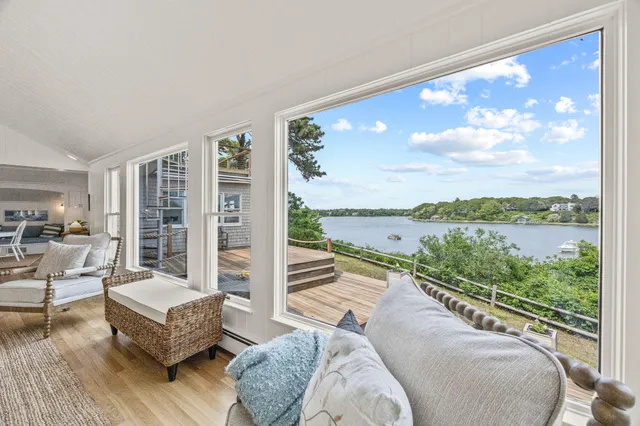 a large kitchen with a table and chairs