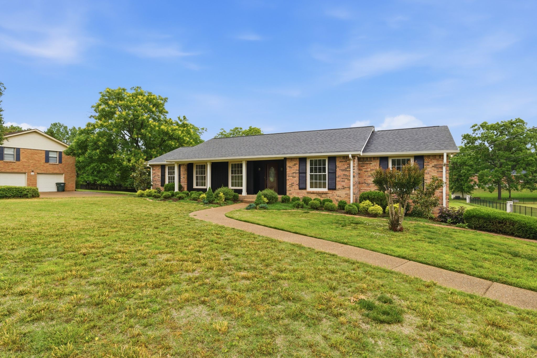 213 Rising Sun Lane Old Hickory, TN 37138 - Photo 2 of 37 a front view of a house with a yard