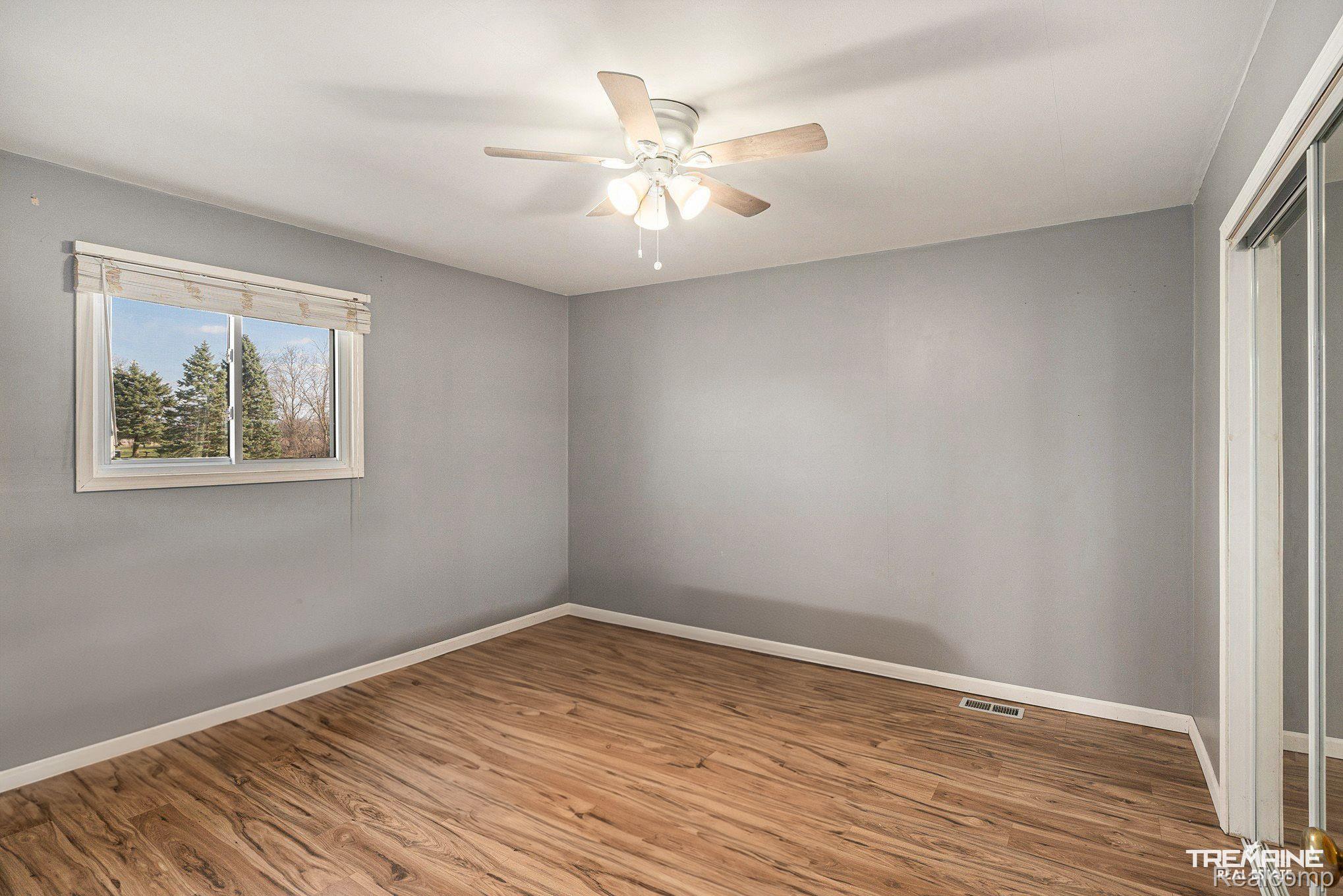 3473 West Ray Road Grand Blanc, MI 48439 - Photo 8 of 29 Main floor bedroom