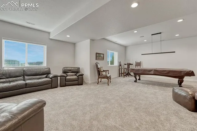 a living room with furniture and a couch