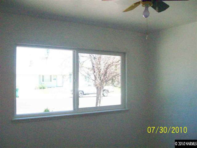 1650 Dayton Way Reno, NV 89502 - Photo 4 of 9 a view of an empty room with a window