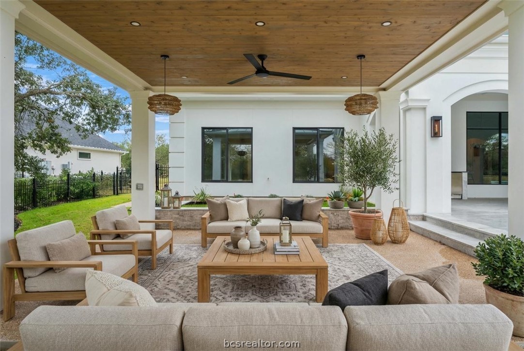 4212 Tuscany Court Bryan, TX 77802 - Photo 35 of 41 a view of a patio with couches table and chairs