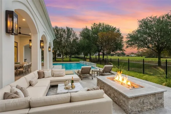 a aerial view of a house with a yard