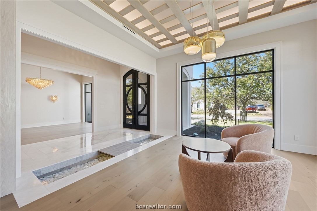 4212 Tuscany Court Bryan, TX 77802 - Photo 7 of 41 a living room with furniture and a large window