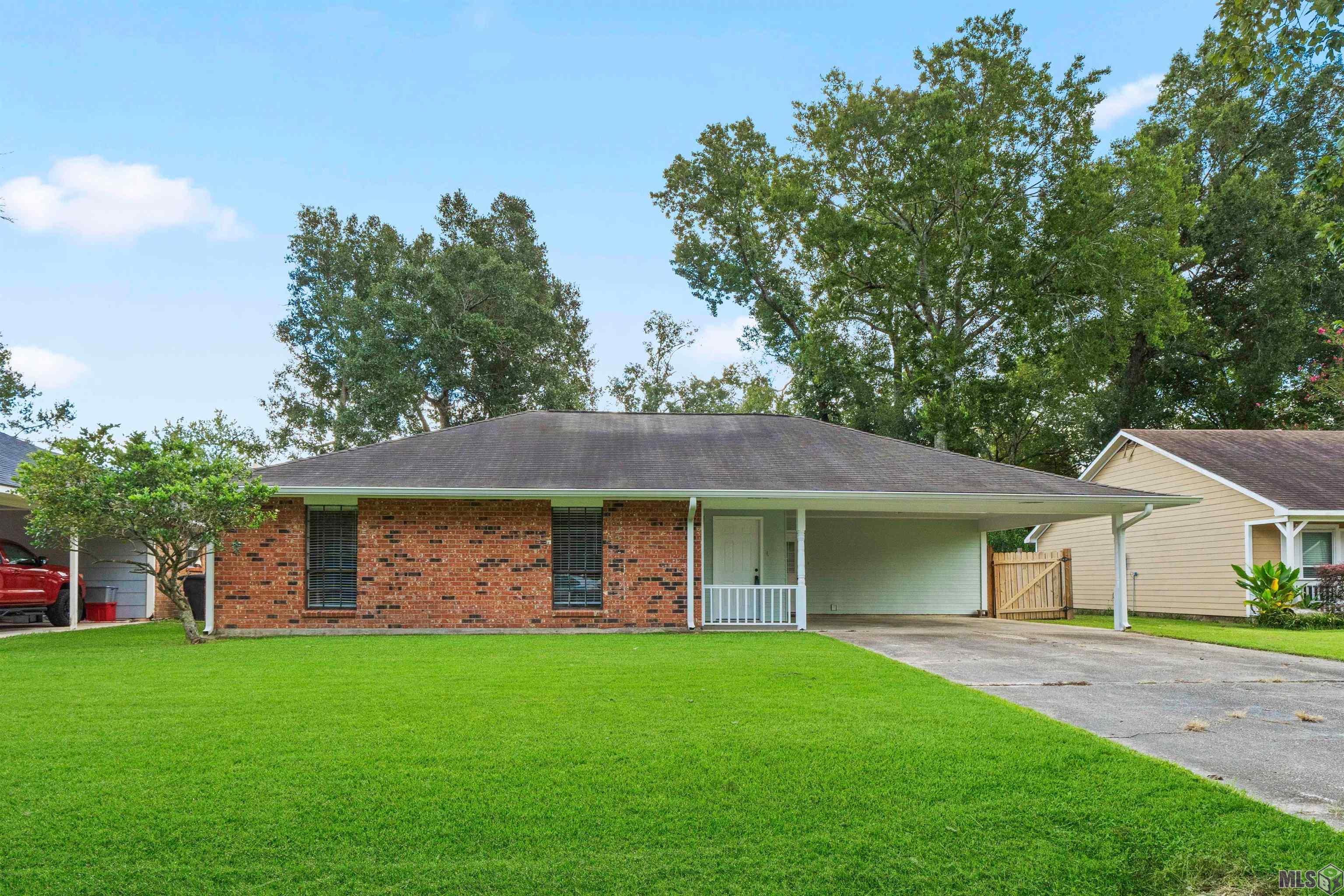 7513 Quorum Drive Baton Rouge, LA 70817 - Photo 1 of 34 Front View w/Carport
