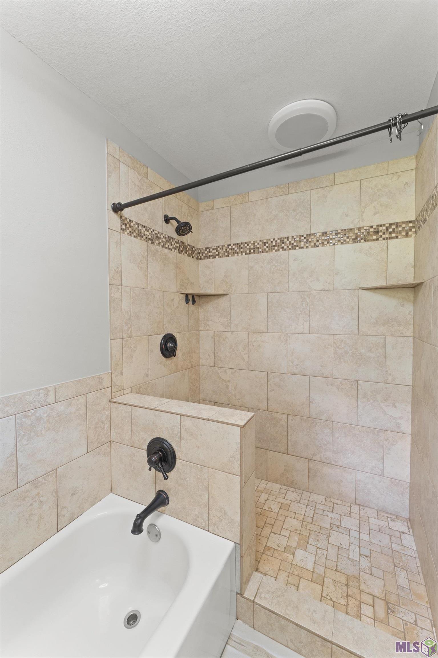 7513 Quorum Drive Baton Rouge, LA 70817 - Photo 21 of 34 5' step in shower stall