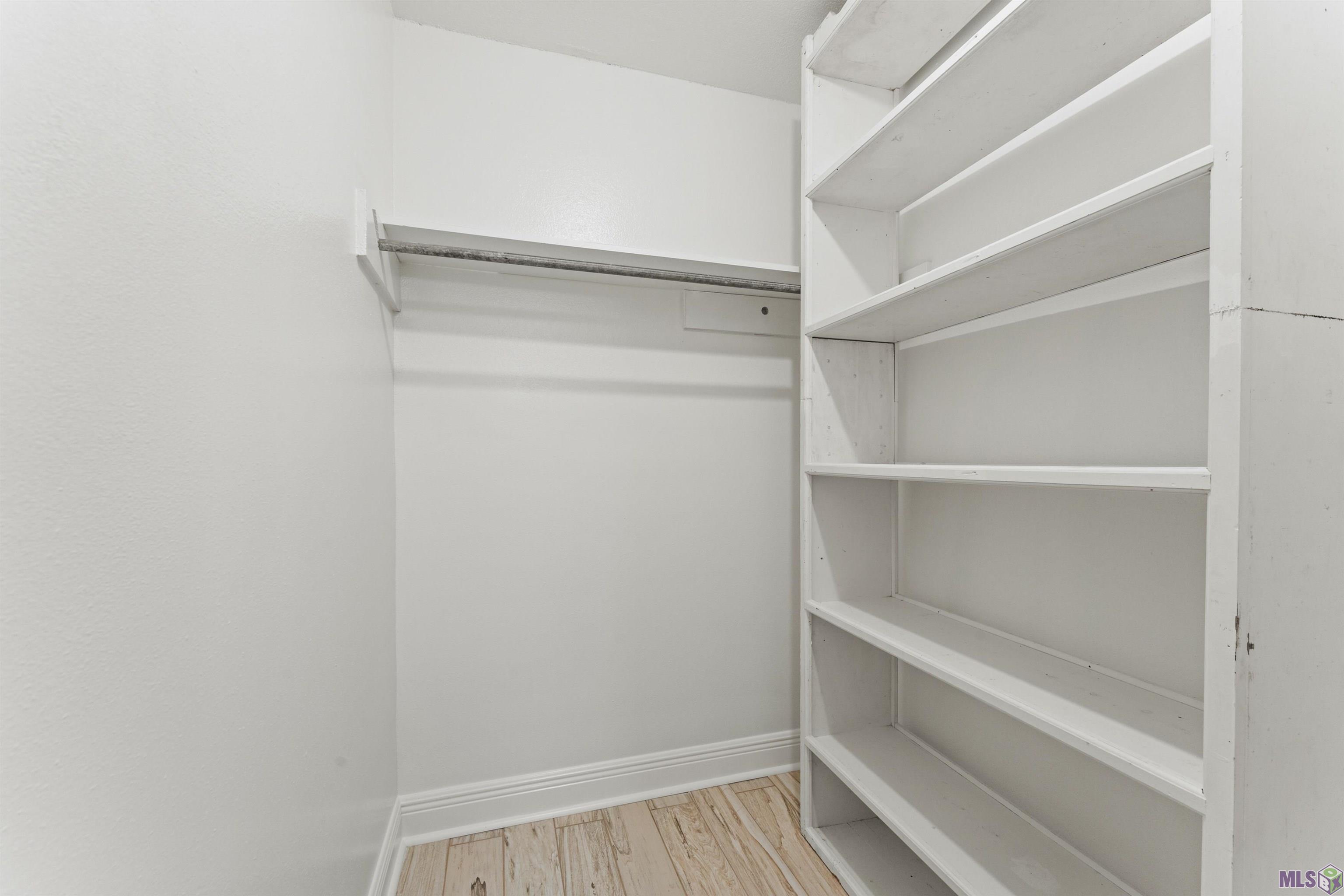7513 Quorum Drive Baton Rouge, LA 70817 - Photo 22 of 34 Spacious Primary closet