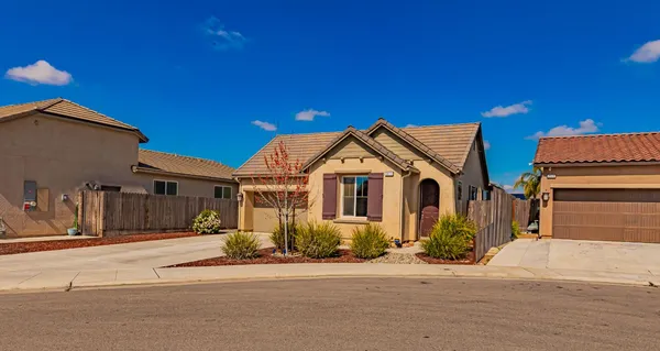 a view of a big house in front of a house