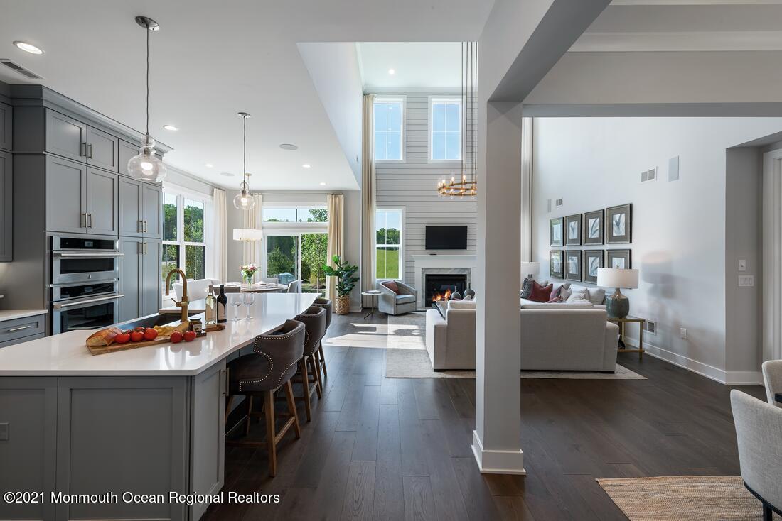108 Sofia Drive Manalapan, NJ 07726 - Photo 4 of 9 a dining room with furniture and wooden floor