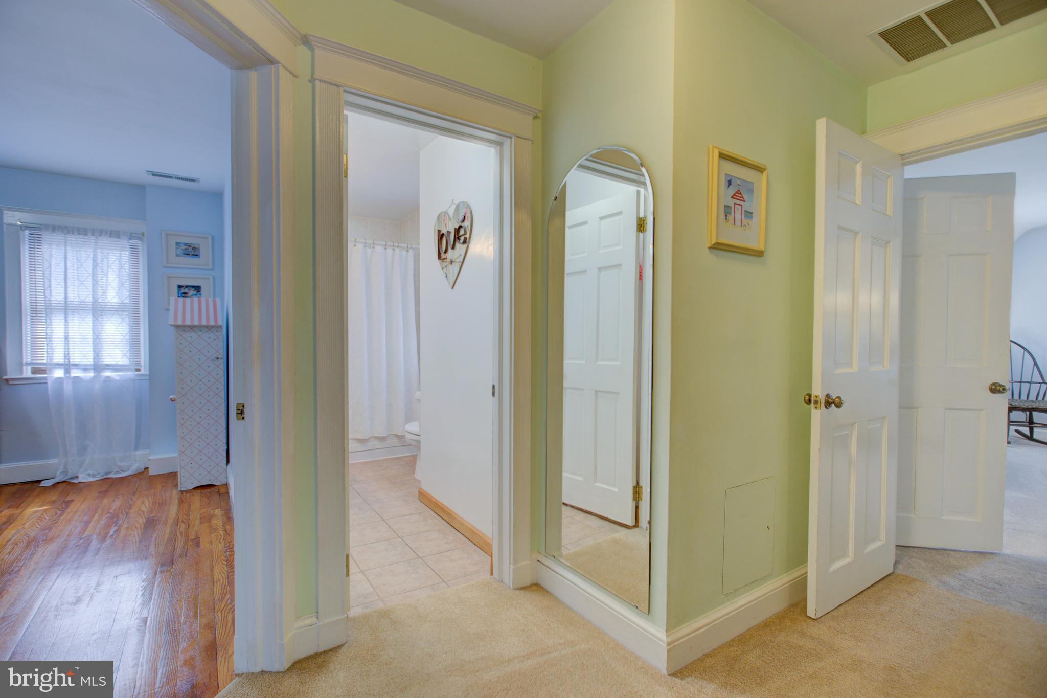 4119 Westview Road Baltimore, MD 21218 - Photo 19 of 51 Upstairs hallway: hardwood under carpet