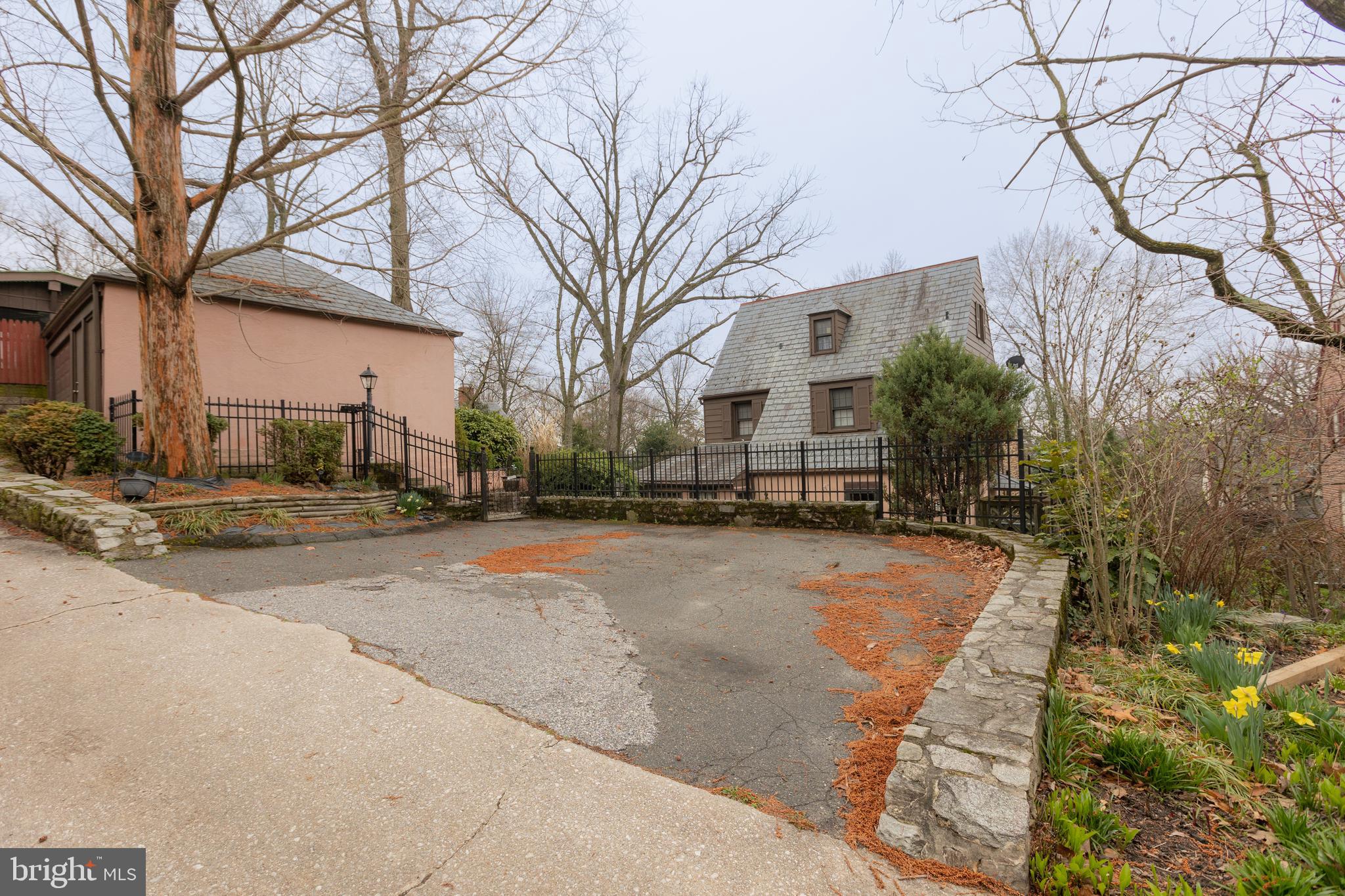 4119 Westview Road Baltimore, MD 21218 - Photo 50 of 51 Parking pad with garage next to it