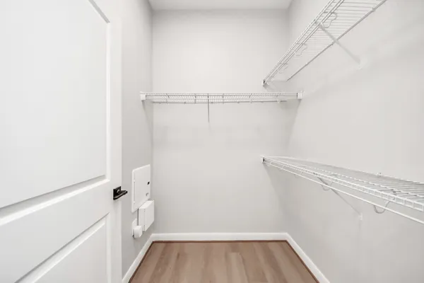 a bathroom with a tub and shower