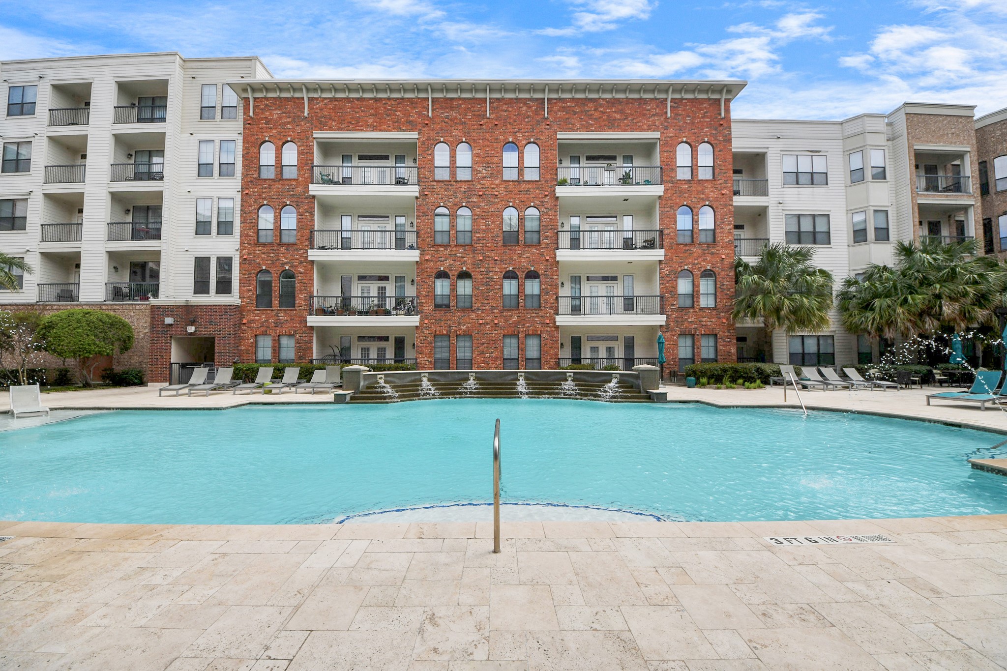 6363 San Felipe Street, Unit 243 Houston, TX 77057 - Photo 6 of 43 a house view with a garden space