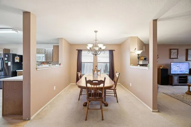 a kitchen with a sink cabinets and window