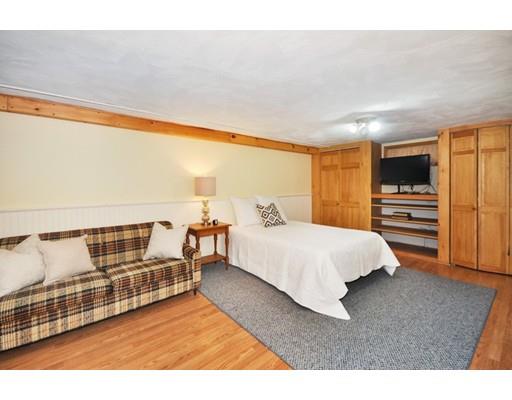 16 Wadsworth Road Arlington, MA 02476 - Photo 23 of 35 a spacious bedroom with a bed and cabinets