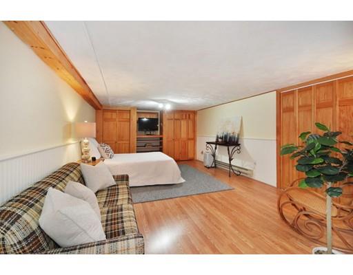 16 Wadsworth Road Arlington, MA 02476 - Photo 24 of 35 a living room with furniture and a wooden floor