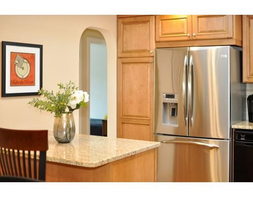 16 Wadsworth Road Arlington, MA 02476 - Photo 28 of 35 a kitchen with refrigerator and cabinets