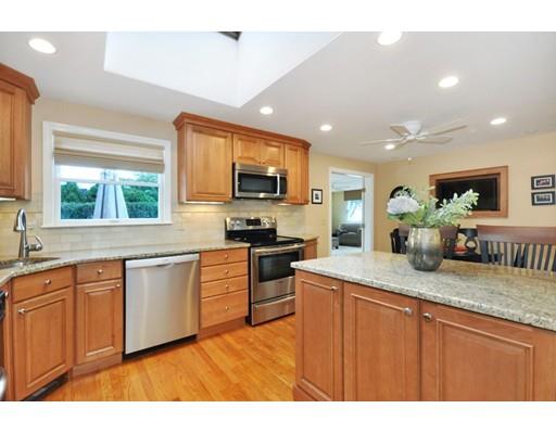 16 Wadsworth Road Arlington, MA 02476 - Photo 9 of 35 a kitchen with stainless steel appliances granite countertop a sink a stove and a granite counter top