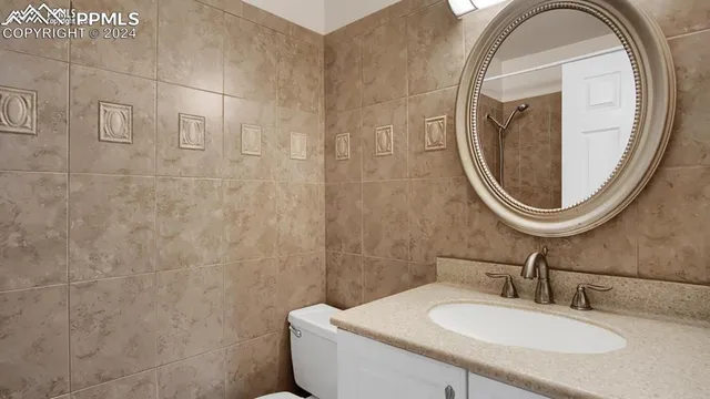 a bathroom with a sink and a toilet