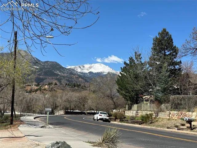 a view of city street with mountain view