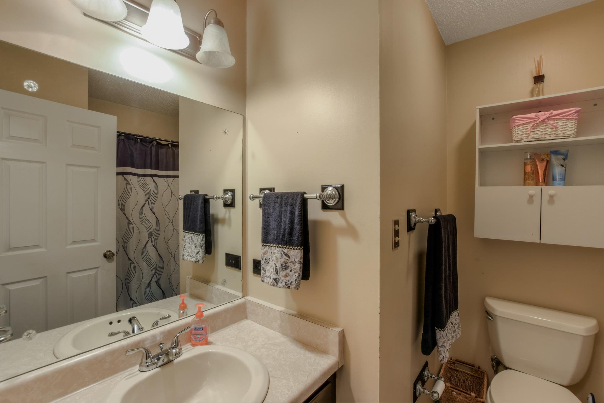2860 South Rutland Road Mount Juliet, TN 37122 - Photo 15 of 20 a bathroom with a sink toilet and shower