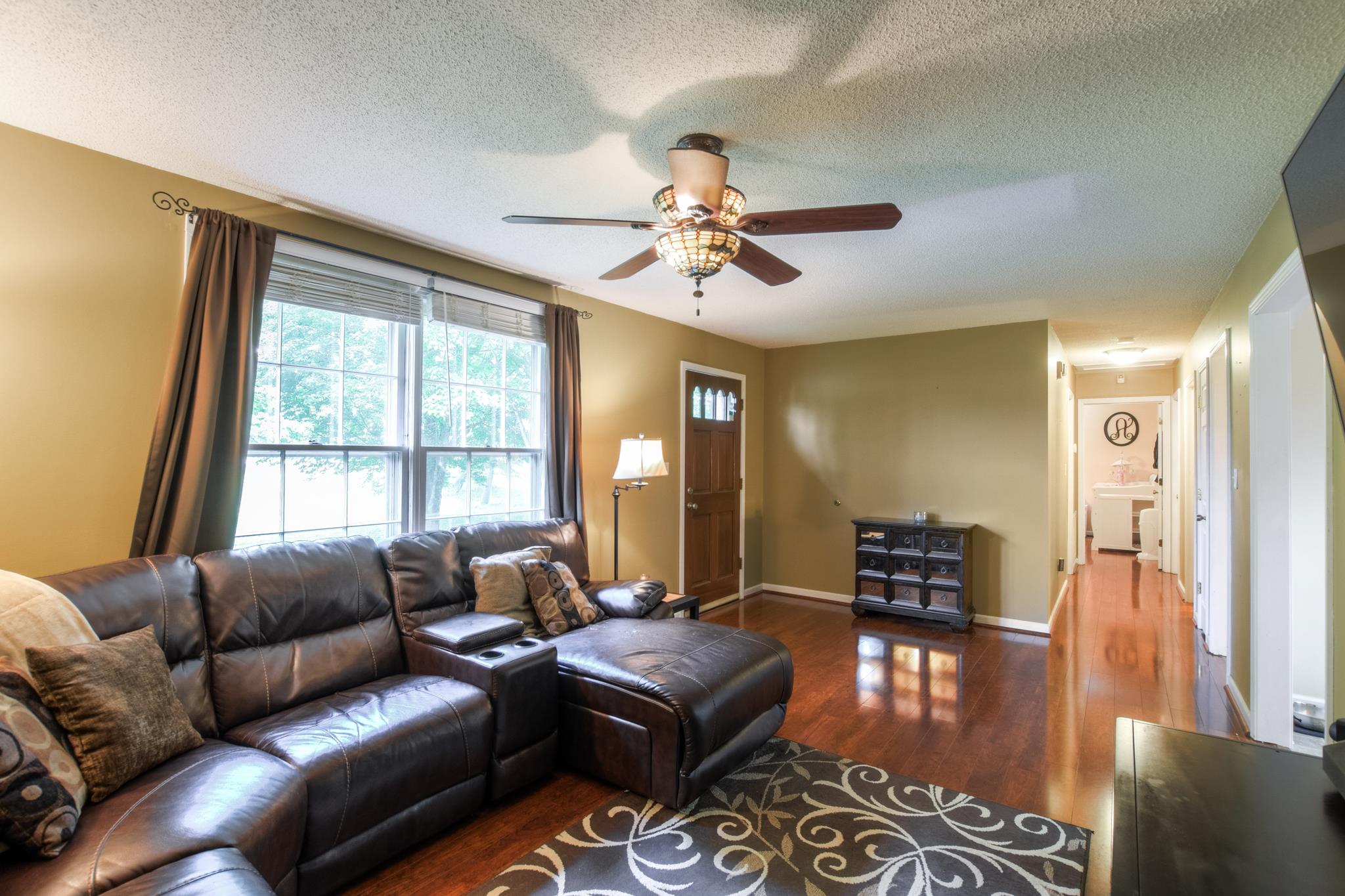 2860 South Rutland Road Mount Juliet, TN 37122 - Photo 4 of 20 a living room with furniture a ceiling fan and a window