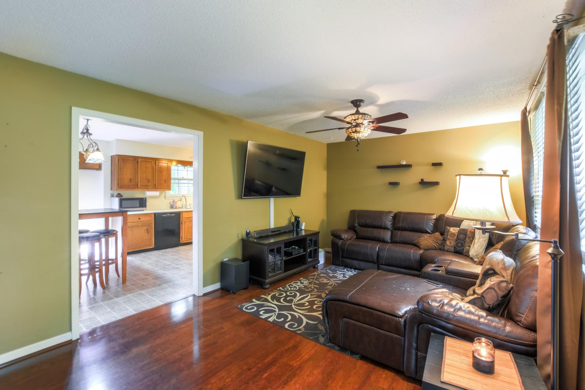 2860 South Rutland Road Mount Juliet, TN 37122 - Photo 6 of 20 a living room with furniture and a flat screen tv