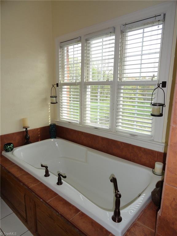 1122 Nance Road King, NC 27021 - Photo 12 of 30 Unwind after a long day in this large jetted tub with views of nature