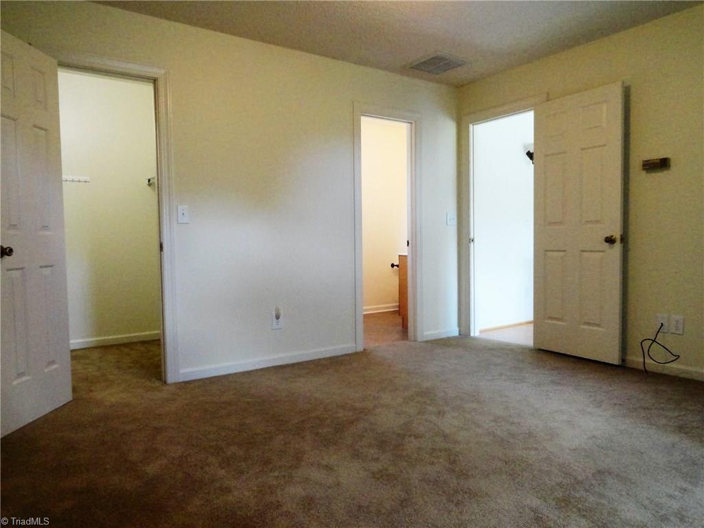 1122 Nance Road King, NC 27021 - Photo 15 of 30 2nd bedroom on upper level with private bath and large walk-in closet