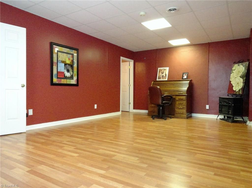 1122 Nance Road King, NC 27021 - Photo 19 of 30 Lower level den would also make a great playroom. Half bath located just off the game room.
