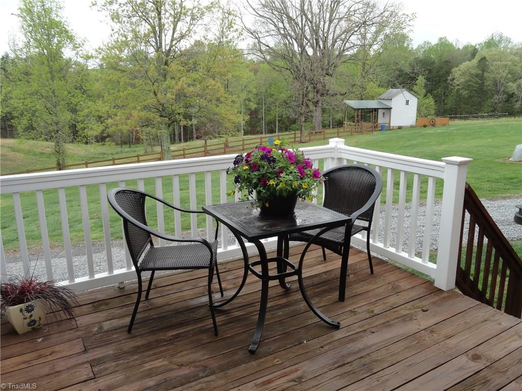1122 Nance Road King, NC 27021 - Photo 27 of 30 Back deck with lovely views of pasture and surrounding woods