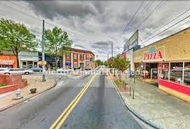 1084 Sanders Avenue Southeast, Unit B Atlanta, GA 30316 - Photo 26 of 28 a view of a swimming pool with outdoor seating