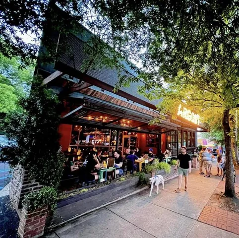 a view of street with sitting area