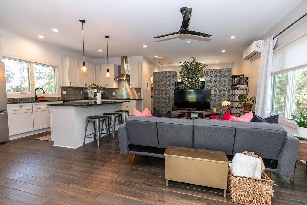 1084 Sanders Avenue Southeast, Unit B Atlanta, GA 30316 - Photo 3 of 28 a living room with furniture and kitchen view