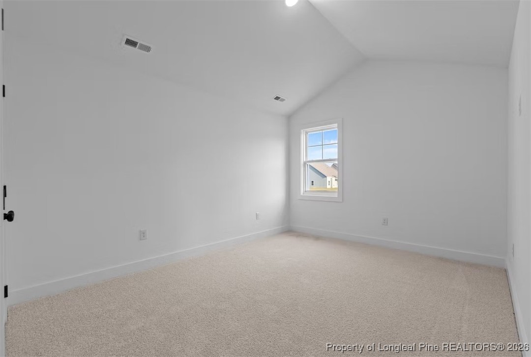 9844 Rockfish Road Raeford, NC 28376 - Photo 13 of 32 a view of an empty room with a window