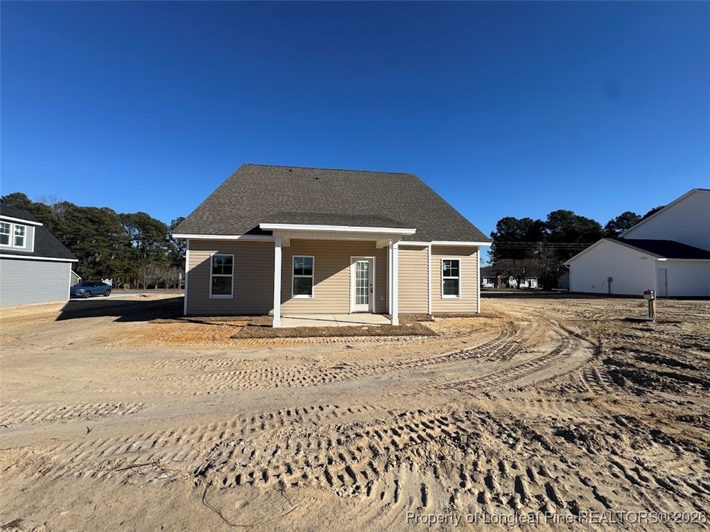 9844 Rockfish Road Raeford, NC 28376 - Photo 14 of 15 a front view of a house with a yard
