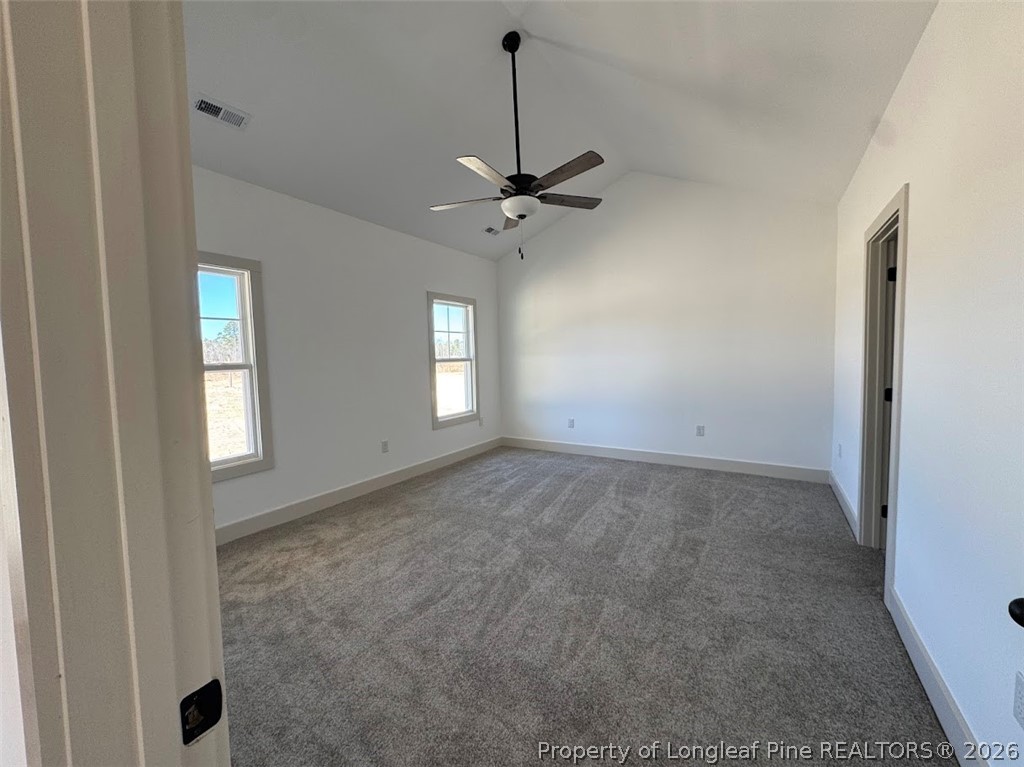 9844 Rockfish Road Raeford, NC 28376 - Photo 23 of 32 a view of an empty room with a window