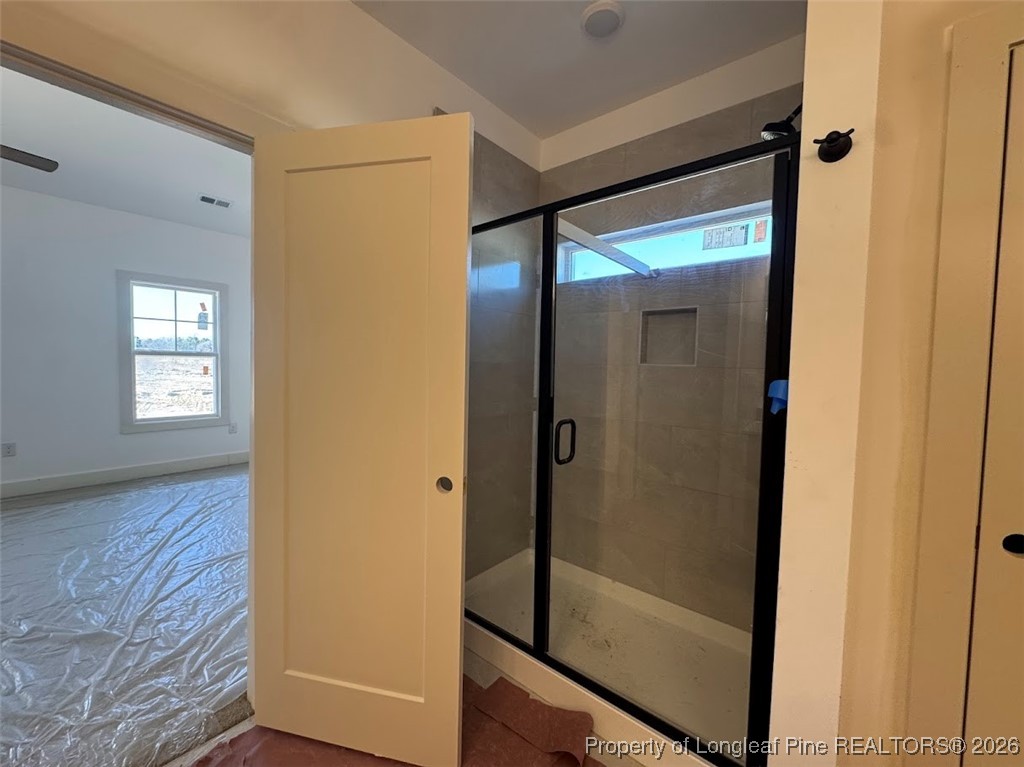 9844 Rockfish Road Raeford, NC 28376 - Photo 7 of 15 a view of elevator with hallway