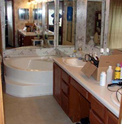 100 Ray Rifle, CO 81650 - Photo 3 of 3 a bathroom with a sink and a mirror