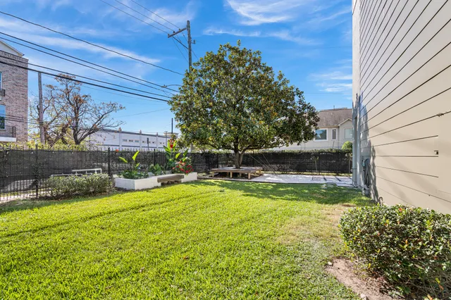 an aerial view of a house with a garden