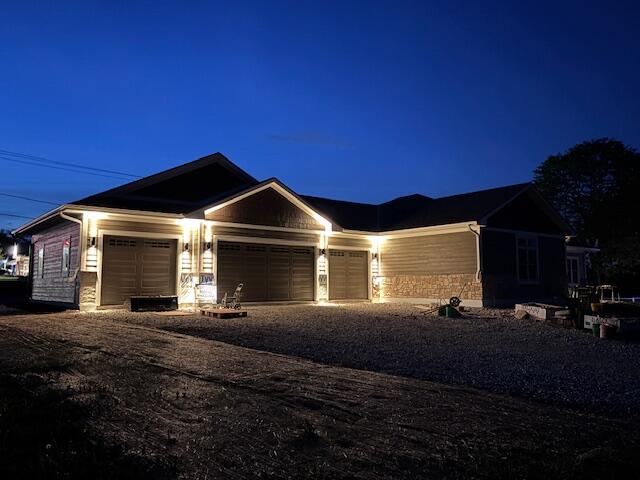 S63-w13464 Windsor Road Muskego, WI 53150 - Photo 37 of 39 View of 4 car garage Twilight
