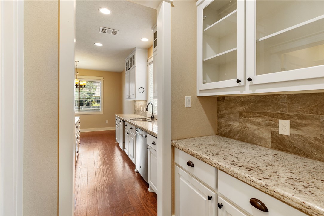 2136 Rockcliffe Loop College Station, TX 77845 - Photo 13 of 48 a view of a kitchen cabinets and a counter place