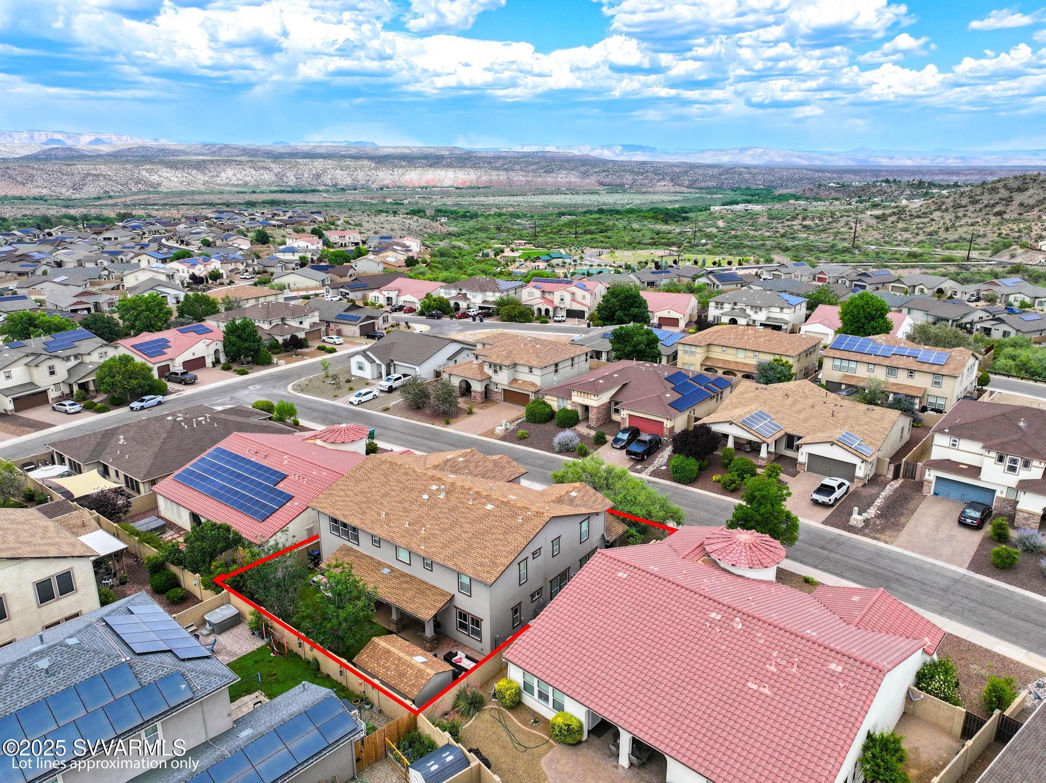 608 Bootleg Road Clarkdale, AZ 86324 - Photo 102 of 111 an aerial view of a city with lots of residential buildings ocean and mountain view in back