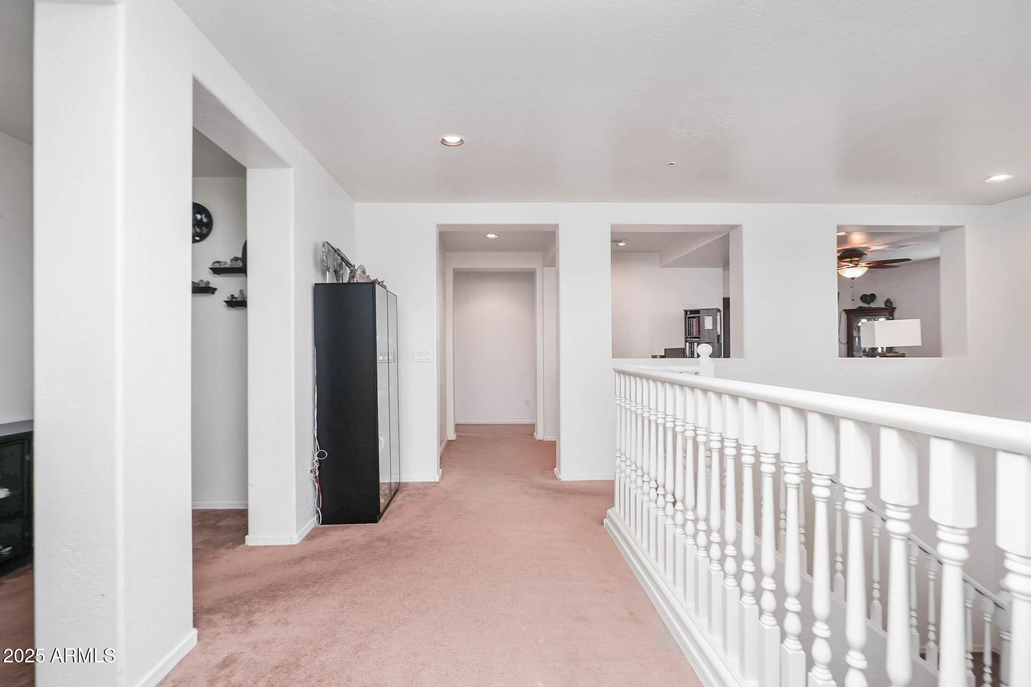 608 Bootleg Road Clarkdale, AZ 86324 - Photo 27 of 111 a view of a hallway with wooden floor and windows
