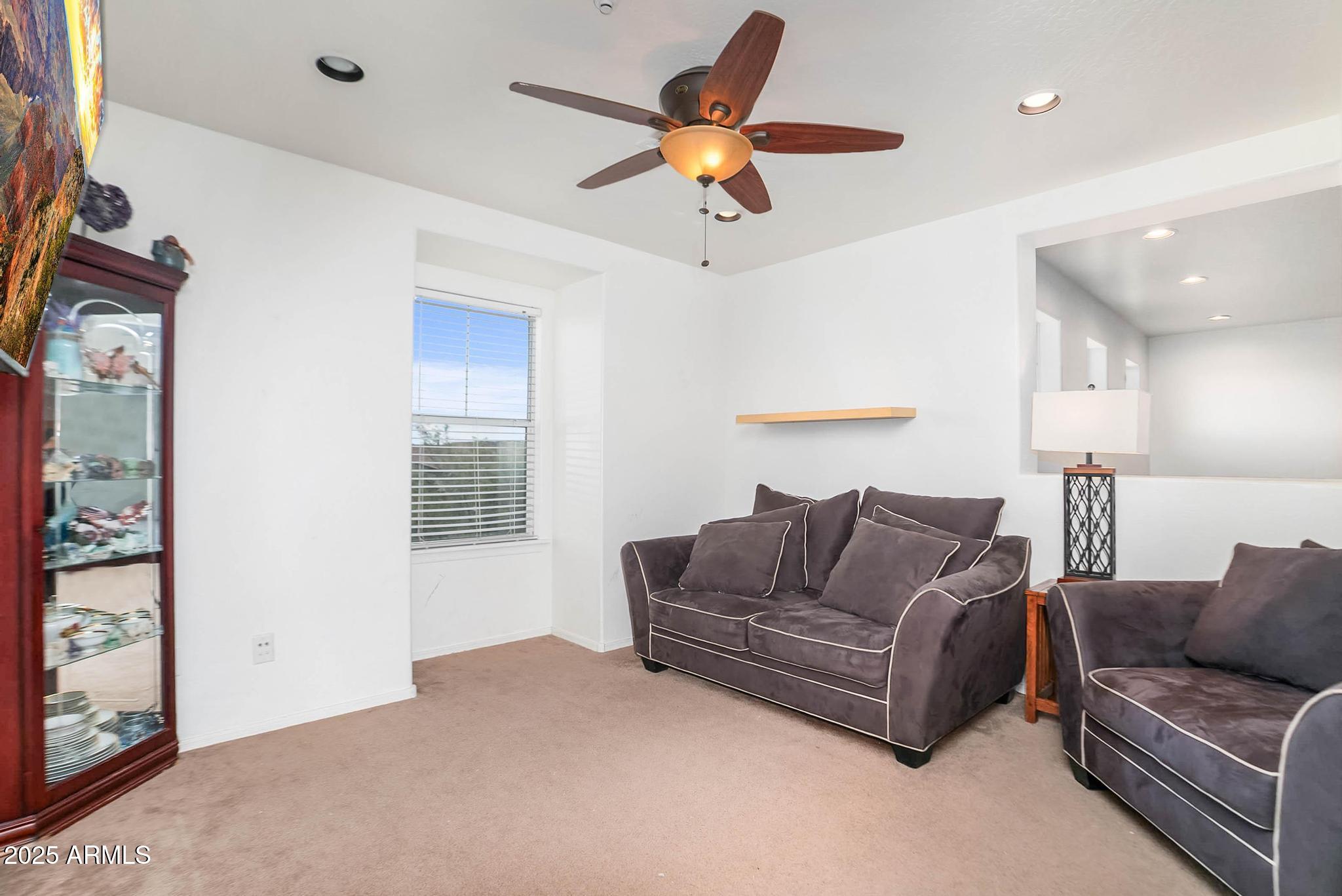 608 Bootleg Road Clarkdale, AZ 86324 - Photo 38 of 111 a living room with furniture and a ceiling fan