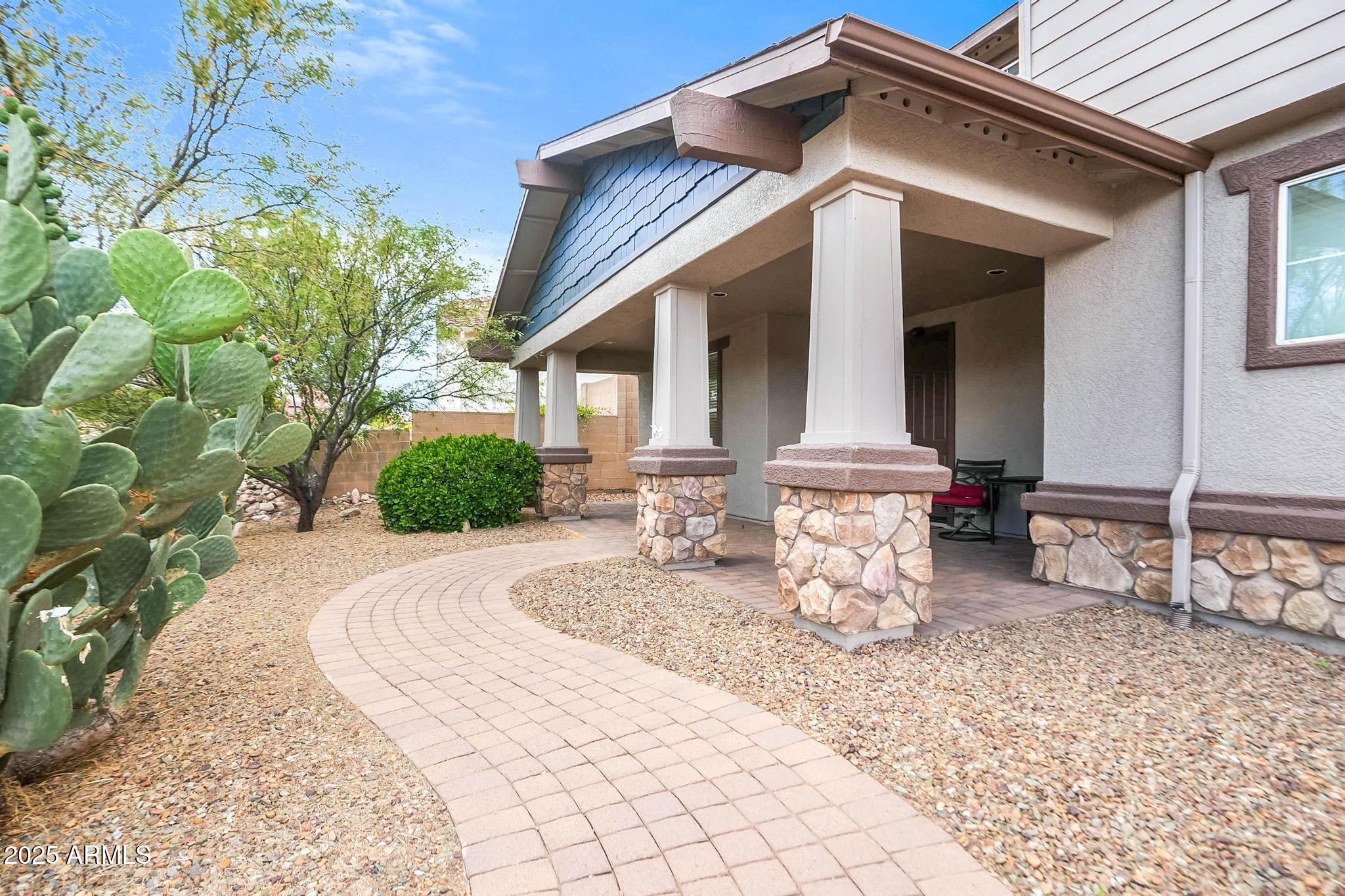 608 Bootleg Road Clarkdale, AZ 86324 - Photo 4 of 111 a front view of a house with table and chairs