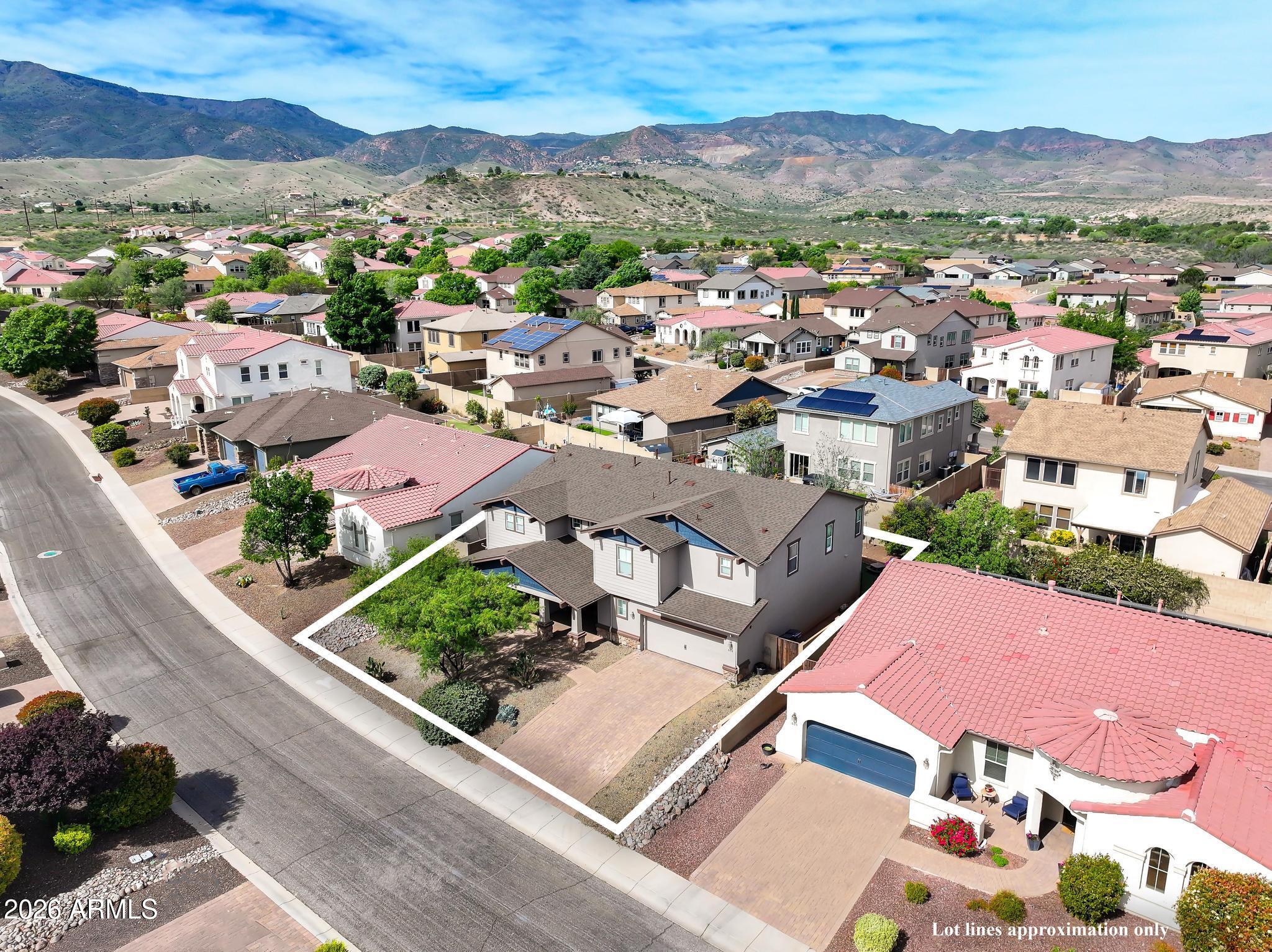 608 Bootleg Road Clarkdale, AZ 86324 - Photo 51 of 56 an aerial view of a city with lots of residential buildings and mountain view in back