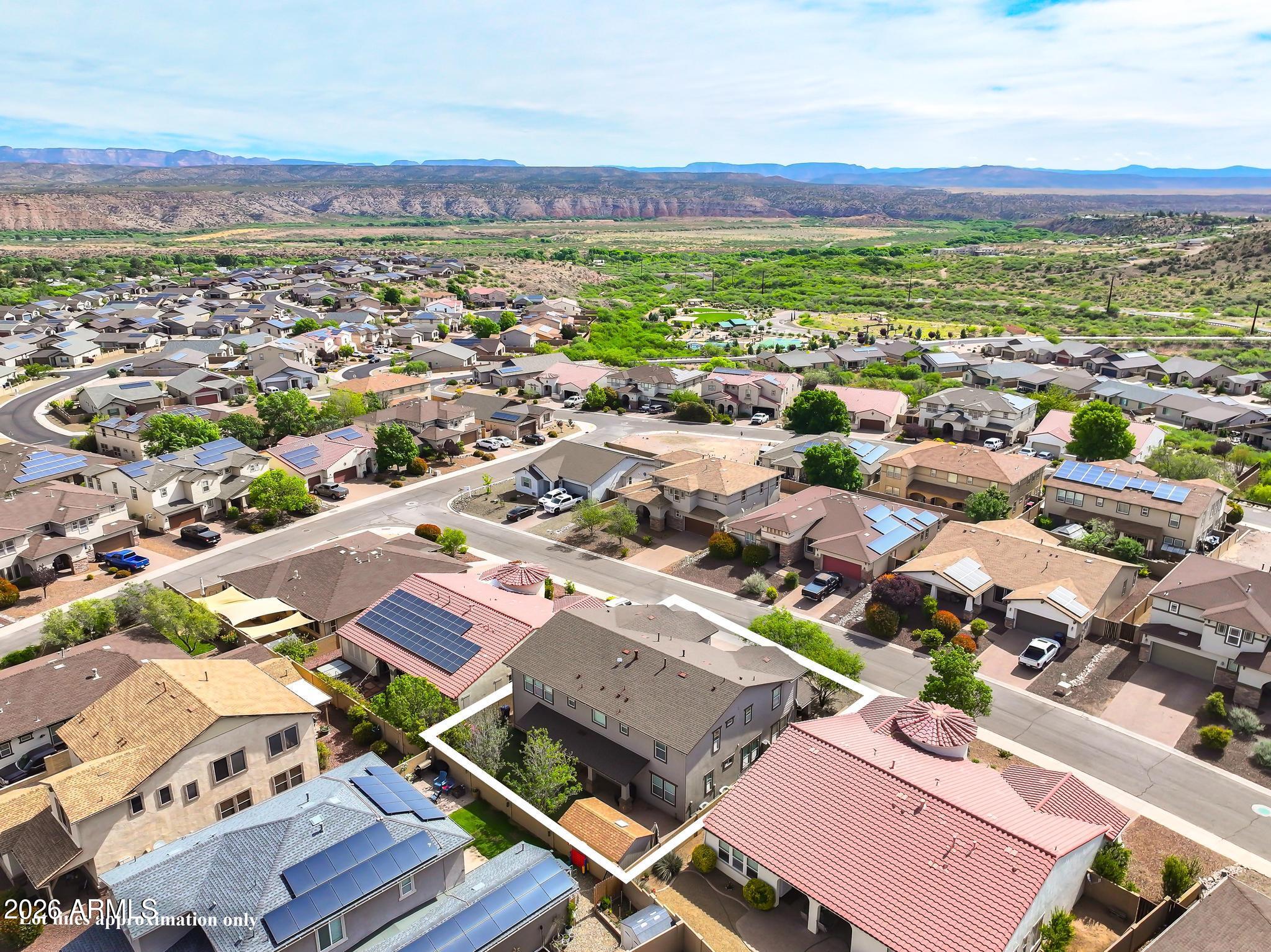 608 Bootleg Road Clarkdale, AZ 86324 - Photo 53 of 56 an aerial view of a city with lots of residential buildings and mountain view in back